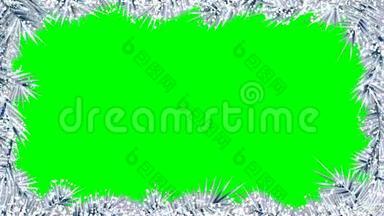 从闪闪发光的，闪耀的冰冻图案和绿色的屏幕后面